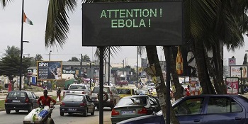 Immagine del cartello con scritta "Attention Ebola"