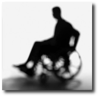 ombra di un uomo su sedia a rotelle