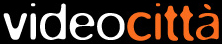 scritta videocittà video in bianco e città in arancione