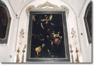 foreground of the Caravaggio's painting with side candelabrums
